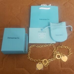 Tiffany & Co. Gold Heart Charm Bracelet And Necklace Set with Blue Packaging